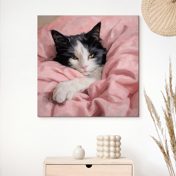 Cat lying in a blanket