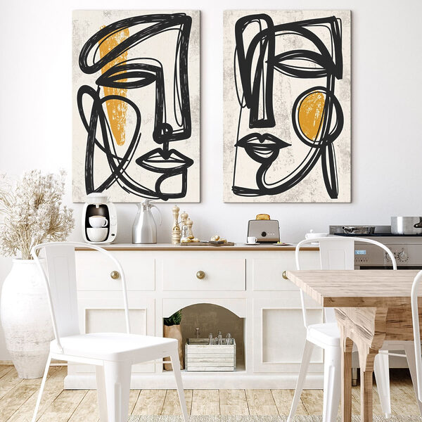 Couple of faces drawn in black and yellow Couple of faces drawn in black and yellow