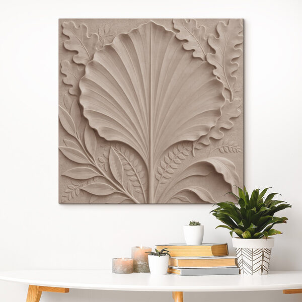 Stone carving of a leaf and leaves